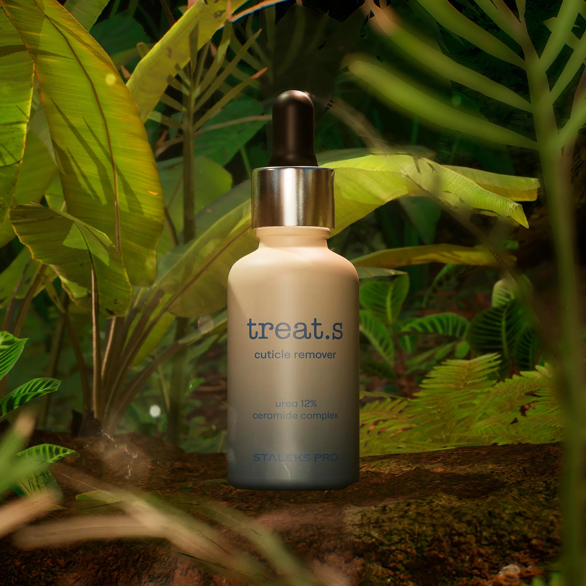 Treats Nagelhautentferner 30ml cuticle remover dropper bottle displayed against lush tropical green foliage background